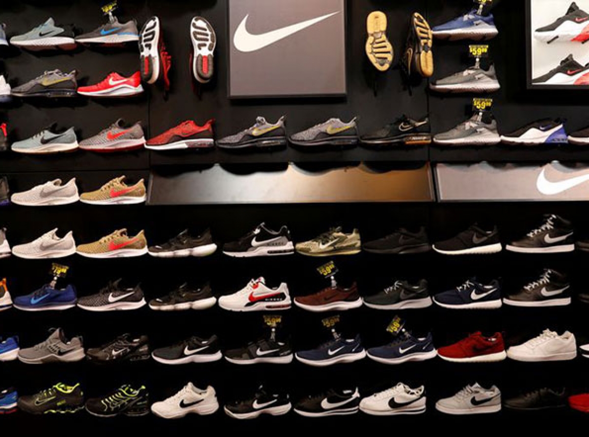 Nike issues a warning about Christmas delays and lowers its full-year sales forecast